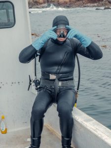 A diver wearing a scuba mask