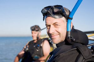 A diver with a dry snorkel